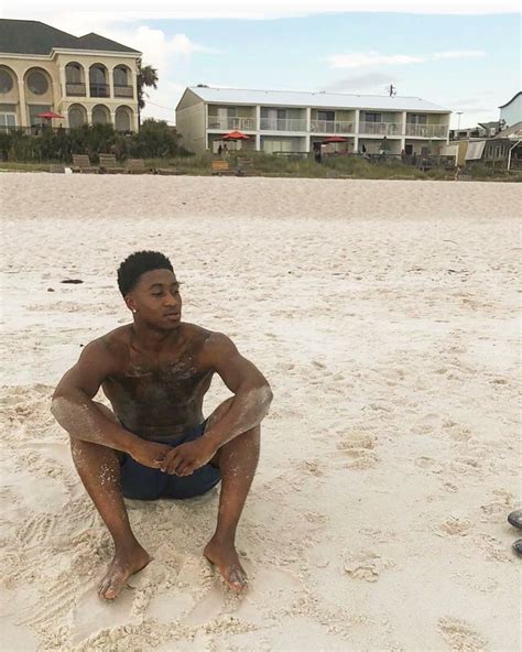 Black Male Feet On The Beach
