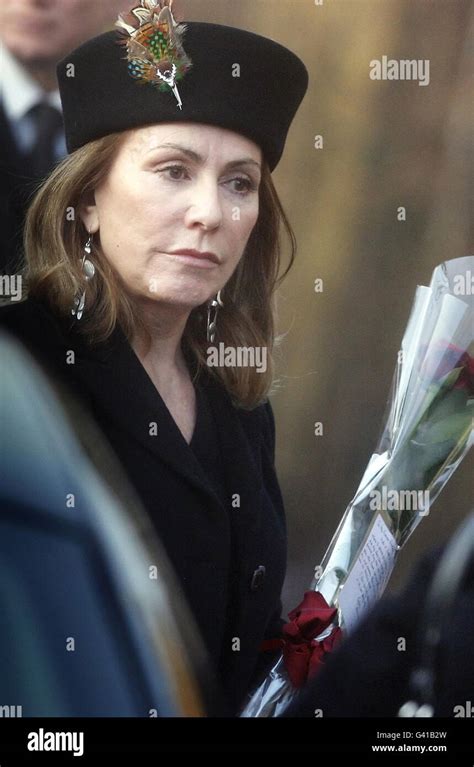 A Mourner Following The Funeral Of Singer Songwriter Gerry Rafferty At