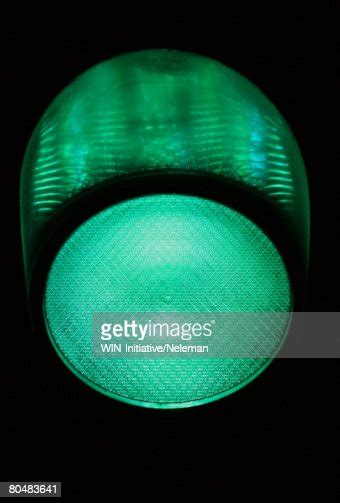 Green Traffic Light At Night Closeup High Res Stock Photo Getty Images