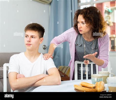 Worried Mother Scolding Teenage Son Stock Photo Alamy