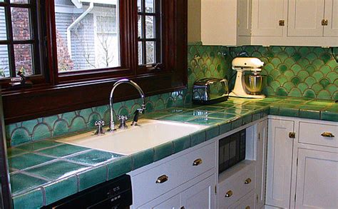There are different options of tile countertops kitchen to choose from according to sense of style, kitchen theme and requirement. Stylish and Affordable Kitchen Countertop Solutions