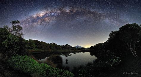 Simply Breathtaking The Milky Way Floats Over A Serene Lake In An
