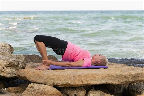 Woman Doing Yoga Exercises At The Beach Stock Image Image Of Lifestyle Background