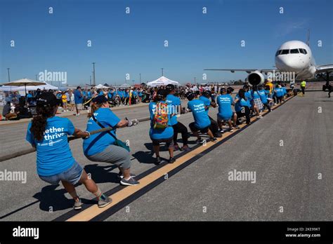 Team Pulling A Ups Airplane At The Special Olympics Of Southern California Plane Pull Fundraiser