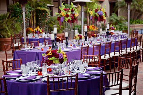 Check out various outdoor wedding venues, wedding venues with a barn, and other venues for a wedding reception. Outdoor wedding reception on the patio at the La Jolla Shores Hotel. Purple table scape. | San ...