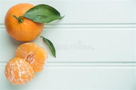 Natural Sweet Clementines On Rustic Table From Above Stock Image