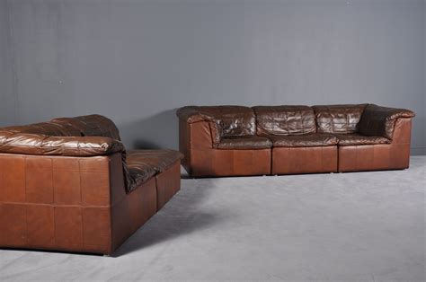 80 x 80 x 70cm element without armrests: Vintage cognac leather patchwork modular sofa from Laauser - Design Market