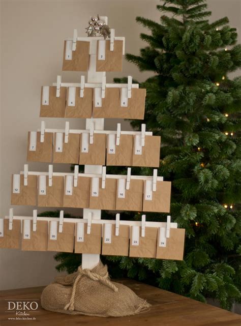 Wie wäre es in diesem jahr mit einem schönen adventskalender aus holz? Adventskalender basteln - hübscher Adventskalender aus ...