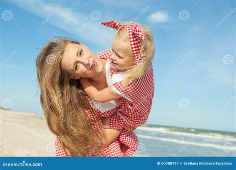Mother And Her Daughter Having Fun On The Beach Stock Image Image Of Beautiful Motherhood