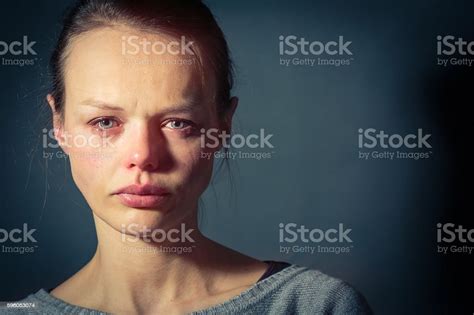 Young Woman Suffering From A Severe Depression Stock Photo Download