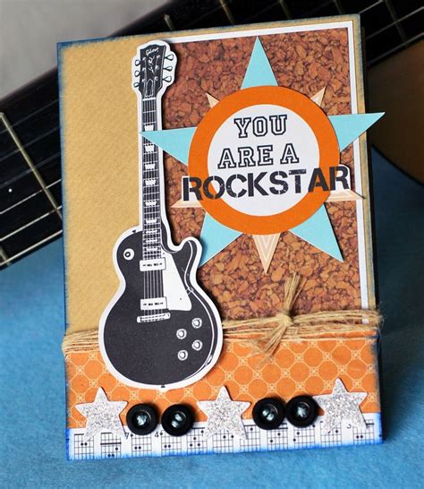 A Card With A Guitar On It And The Words You Are Rockstar Written In Orange