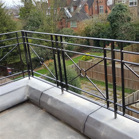 Contemporary porch with stainless steel cable railing. Roof Terrace Railings | Titan Forge Ltd