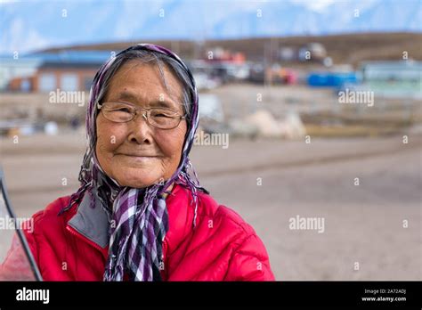 Portrait Of A Eskimo Inuit Senior Woman Outdoors In Pond Inlet Baffin Island Canada Stock