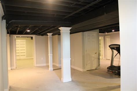 Basement Remodel With Painted Exposed Ceiling