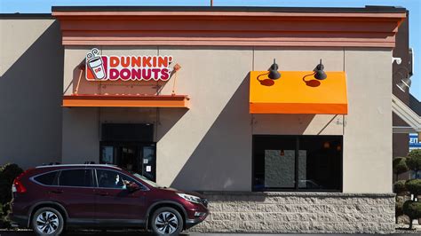 Dunkin' fans sue coffee giant over hidden surcharge that 'hit them over