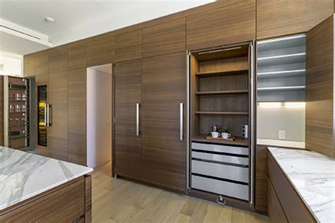 Kitchen cabinets range widely from $100 to $1,200 per linear foot. Slab Kitchen Cabinets in NYC