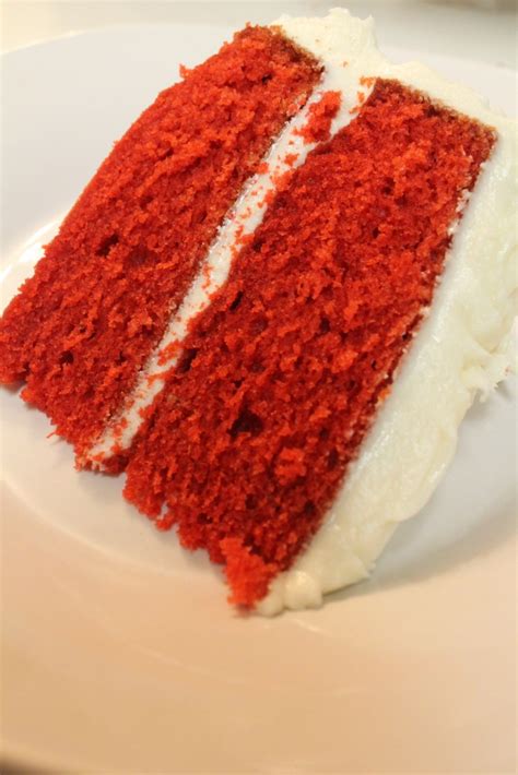 This red velvet cake is a two layer, round cake with a generous amount of cream cheese frosting surrounding it. BEST Red Velvet Cake Recipe | I Heart Recipes