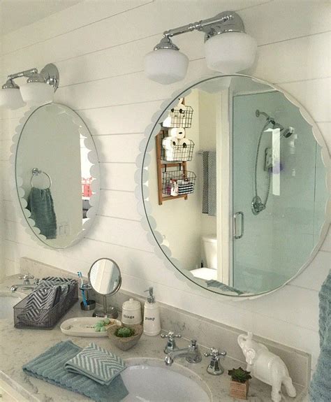 The natural textures and woods of a rustic or farmhouse design call for bathroom vanity lighting that is diffused, embracing frosted shades and distressed metal accents. 10 Bathroom Vanity Lighting Ideas - The Cards We Drew