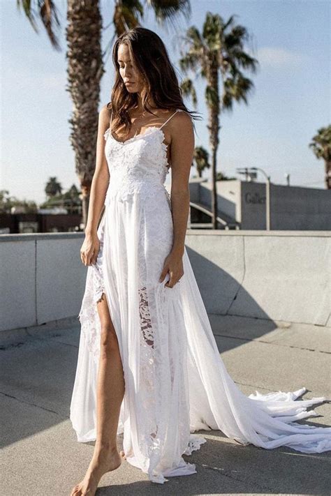 A flowing dress is suitable for a beach wedding because it will billow slightly in beach breezes. White Lace Chiffon A-line Spaghetti Strap Beach Wedding ...