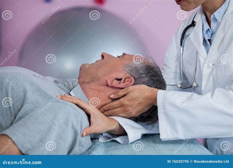Senior Man Receiving Neck Massage From Physiotherapist Stock Image Image Of Chiropractor
