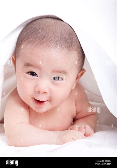 Adorable Baby Lying On The Bed Stock Photo Alamy
