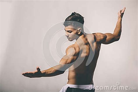 Muscular Young Man Posing In The Studio Stock Photo Image Of Posing