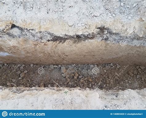 Deep Ditch Dug In Rocks And Dirt And Soil Stock Photo Image Of Hole