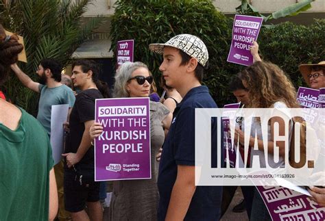 Israelis Hold Signs During A Protest Against The Turkish Military