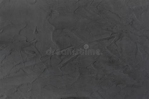 Dark Gray Background Imitating A Concrete Wall With An Abstract Pattern