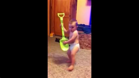 Cute Baby Playing Guitar On A Shovel Youtube