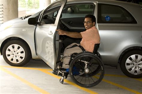 Disabled Free Stock Photo A Disabled Man In A Wheelchair Getting