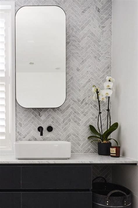 Ancient marble is ideal for a guest bathroom, as it can be dressed up in a variety of ways with colorful accents and appeals to all genders and tastes. Ditch the old boring mirror for a rectangular mirrored ...