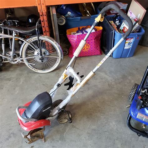Tiller has two tilling depth settings, which are easy to adjust. HOMELITE ELECTRIC TILLER - Big Valley Auction