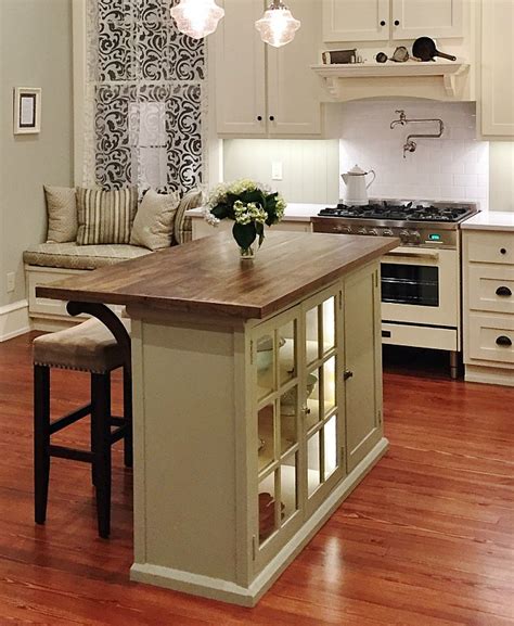 While the first selection is tall, it's fairly narrow and so we include it in our small corner cabinet list. How to Build a Kitchen Island from a Cabinet | Thistlewood ...