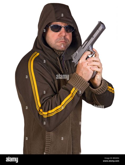 Man In A Hood With Gun Stock Photo Alamy
