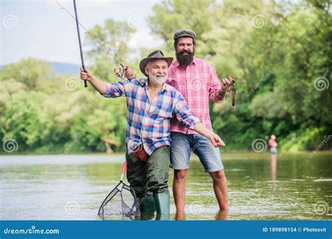 Fishing Peaceful Activity Father And Son Fishing Grandpa And Mature