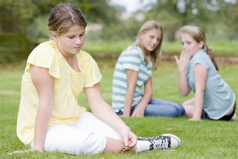 Two Young Girls Bullying Other Young Girl Outdoors Kindercare Pediatrics Kindercare Pediatrics