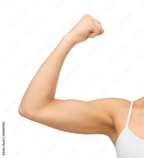 Sporty Woman Flexing Her Biceps Stock Photo Adobe Stock
