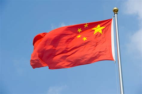 Download China Flag At Day Wallpaper