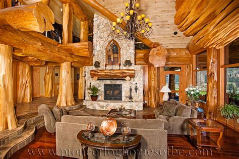 Greatroom In What Appears To Be A Round Log Post And Beam Home By