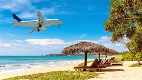 Plane Landing At Caribbean Resort Airplane Flies Over Tropical Ocean
