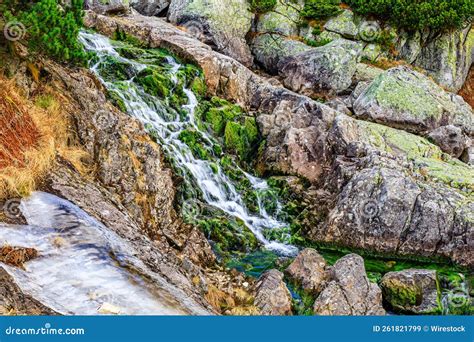 Beautiful Landscape Of A Waterfall Falling Down A Cascade Of Rocky