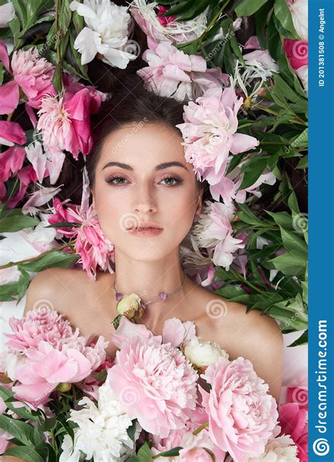 Beautiful Woman With Lots Of Pink Flowers In Her Hands Woman With Long