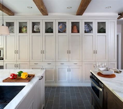 Kitchen cabinet soffits are often space fillers, there are decorative ways to disguise or improve the look of them and there's the more challenging architectural while our issue is one of a full drop down ceiling, i've been in plenty of kitchens with a similar issue of soffits that exist just above the cabinets. Idea File: Floor to Ceiling Cabinets | Kitchen wall ...