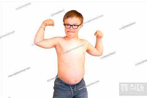 Young Boy With Downs Syndrome Flexing His Muscles Stock Photo Picture