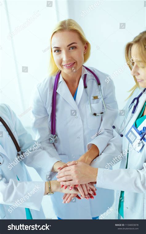 Doctors Nurses Medical Team Stacking Hands Stock Photo 1134003878