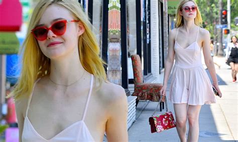 Elle Fanning Flashes Porcelain Skin In Skimpy Mini Dress On Hot Summer