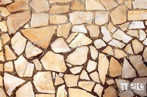 Masonry Rock Stone Tiles Floor On The Park Background Pattern Texture