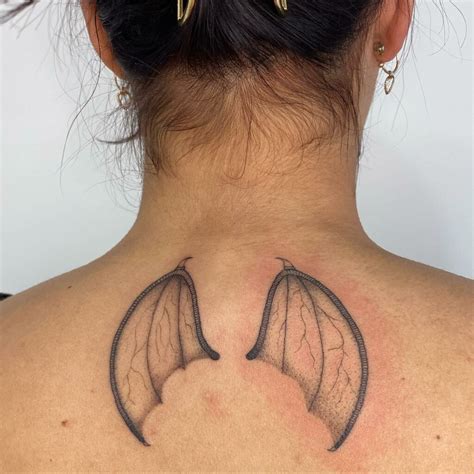 12 Wings Neck Tattoo Ideas For 2024
