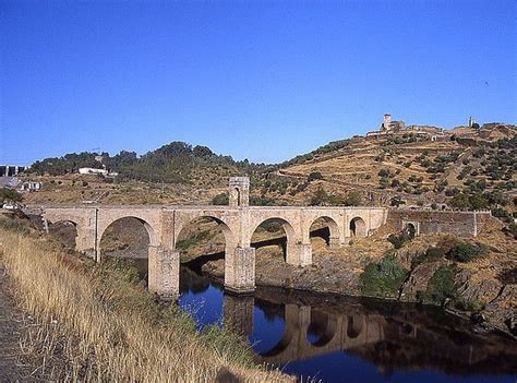 Crossing The Tagus River At Alcántara In Spain The Alcántara Bridge